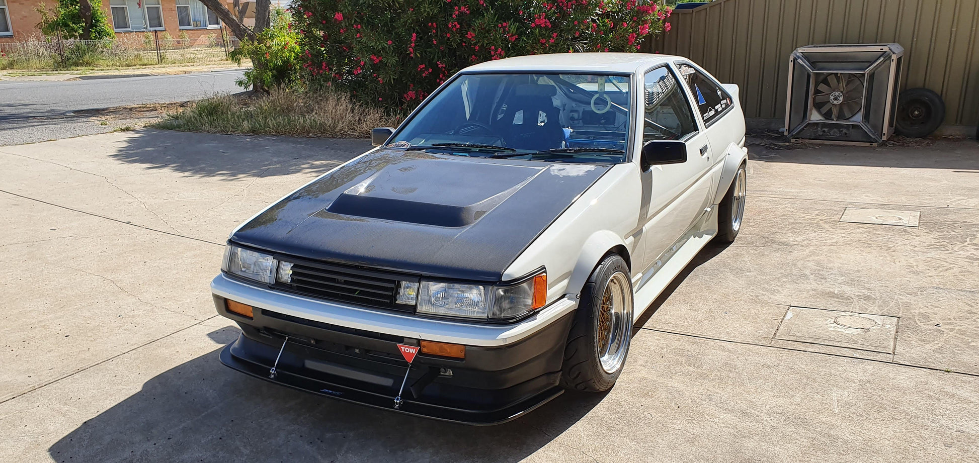 Toyota AE86 50mm OEM style front fenders, aftermarket widebody upgrade designed for improved wheel clearance and aggressive stance