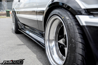 Toyota AE86 Levin Trueno Zenki style side skirts by JSAI Aero, aftermarket body kit upgrade for classic JDM Sprinter enhancing side profile and styling