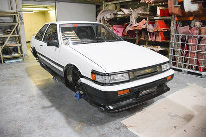Toyota AE86 JDM Zenki style front lip, aftermarket body kit component enhancing front-end styling and aerodynamic performance