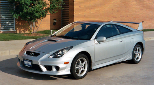 Silver Toyota Celica T23 with JSAI Aero front lip and side skirts aftermarket body kit front angle view
