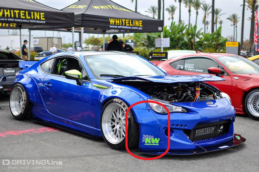 Blue Toyota GT86 Subaru BRZ with JSAI Aero front over fenders installed aftermarket widebody kit front detail view
