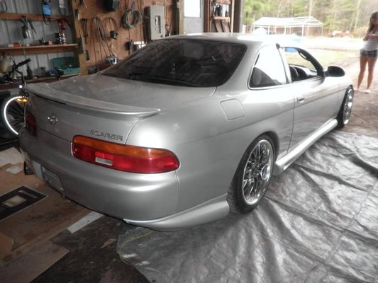 Toyota Soarer with Bomex rear pods installed, aftermarket body kit upgrade enhancing rear styling and aerodynamic appearance