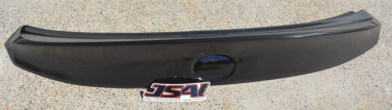Wald rear spoiler in gel coat finish, unpainted aftermarket body kit part ready for paint and installation